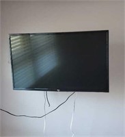 LG flat screen television, wall mount