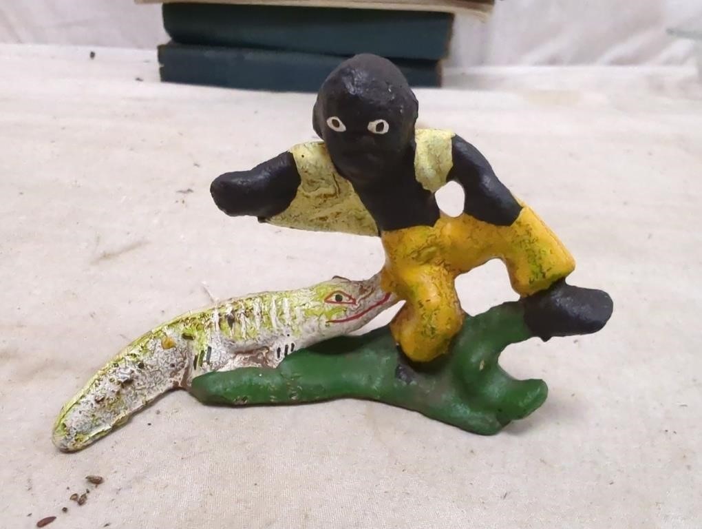 black boy and lalligator