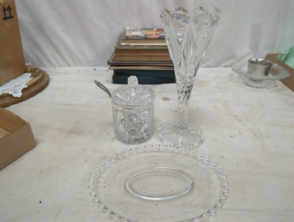 crystal glass and a candle wick platter