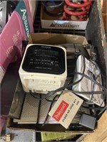 assorted electronics including Polaroid camera