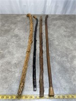 Assortment of walking sticks, set of 4