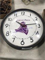 Knight Pride battery-powered clock, 12" across