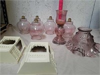 Group of light pink glass candle holders and