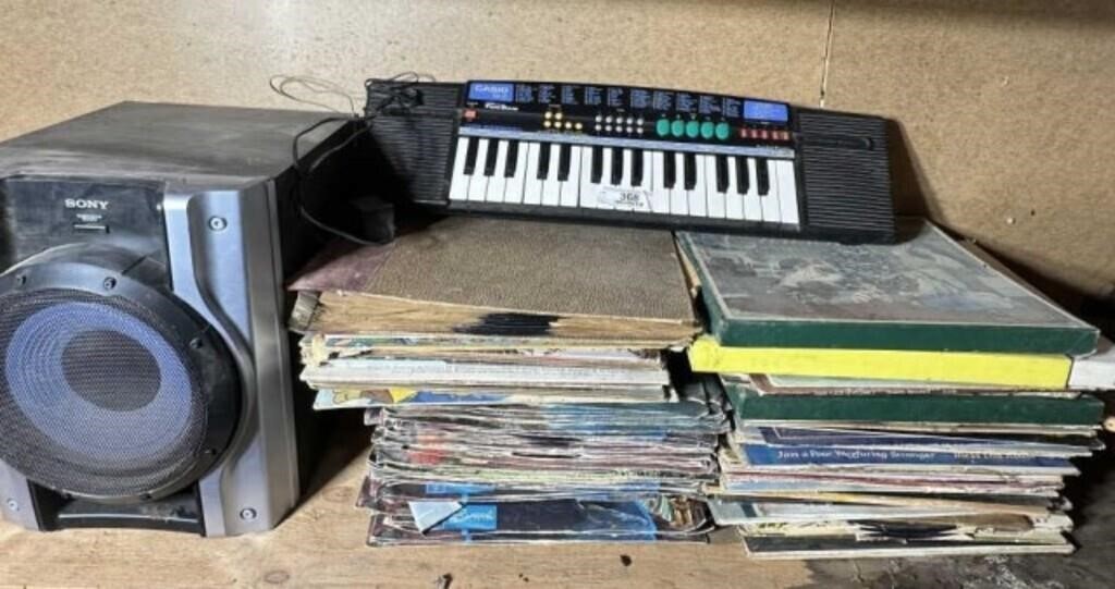 Vinyl Records, 2 stacks & Small Casio Keyboard