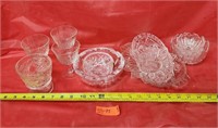 Assorted glass bowls and vases