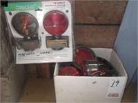 Box of unused magnetic towing light & box of misc