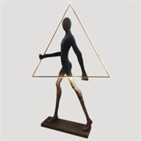 Sculpture holding triangle
