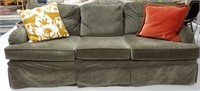 Couch w/Green Slip Cover