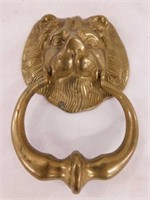 Brass lion head door knocker, 7" long