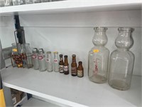 Vintage milk bottles and salt and pepper shakers