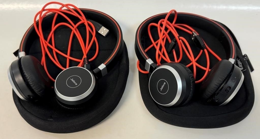 TWO LIKE NEW JABRA HEAD SETS W CORDS AND CASES