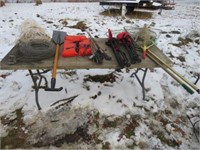 Fish nets, chairs, fishing poles, life jacket