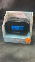 Sharp digital alarm clock