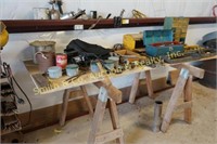 CONTENTS OF TABLE & WALL W/ SAW HORSES & WOOD