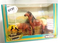 # 750301 Americas Wild mustangs  NIB