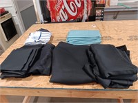 Table Cloths Three Black 51x70. One Black 52x60.