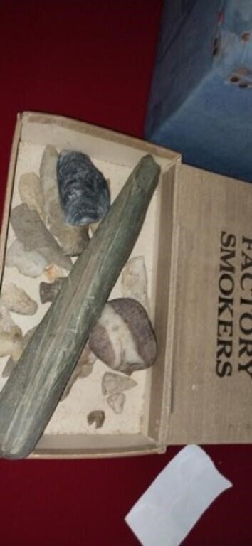 Collection of arrowheads stones and more