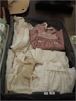 Container of vintage children's clothing: