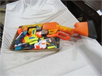 assorted Nerf style guns and bullets