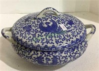 Beautiful ceramic two handled covered bowl with