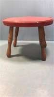 Red wood and vinyl stool