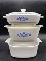 (4) Two Corning Ware with 1 cloudy Lid, 1 white