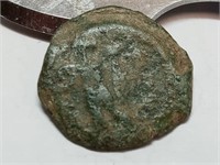 OF)  Ancient Roman coin