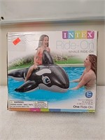 Ride on blow up whale