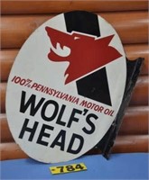 Vintage 1971 Wolf's Head metal flange sign