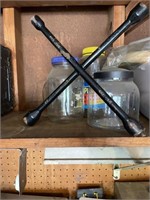 4 glass jars and an “X” wrench