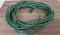 Green extension cord. Approx 15 ft