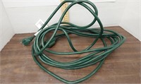 Green extension cord. Approx 10ft