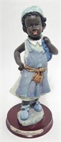 Child Figurine - Louis Dionne