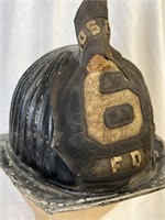 ANTIQUE METAL FIRE HELMET WITH LEATHER BADGE
