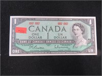Can Centennial dollar bill
