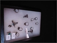 Group of mostly unmarked silver rings including