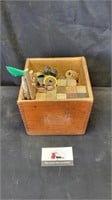 Wooden box with tinker toys and misc