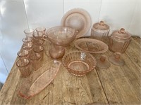 Pink Depression glass. 23 pieces.