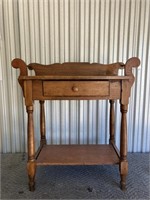 Washstand. Has been repaired. Measures