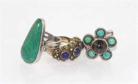 Three silver rings including turquoise & lapis