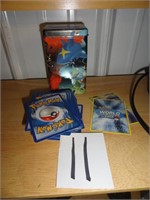 Pokemon tin & cards