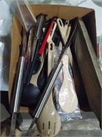 Box full of cooking utensils