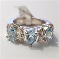 $300 Silver Blue Topaz Ring