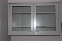 Wall mounted storage cabinet w/glass doors