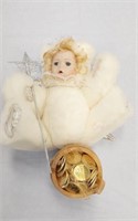 PORCELAIN DOLL WITH WOODEN BUCKET