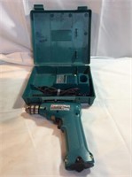 Makita 10mm cordless drill with charger and
