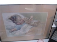 Old, framed sleeping child with teddy bear