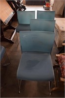 Five Heavy Duty Plastic Stacking Chairs