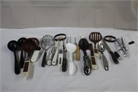 Assortment of kitchen utensils, ladle, egg