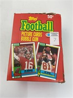 36 unopened packs of 1990 Topps football cards